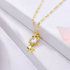 Gold-plated cat necklace with cubic zirconia