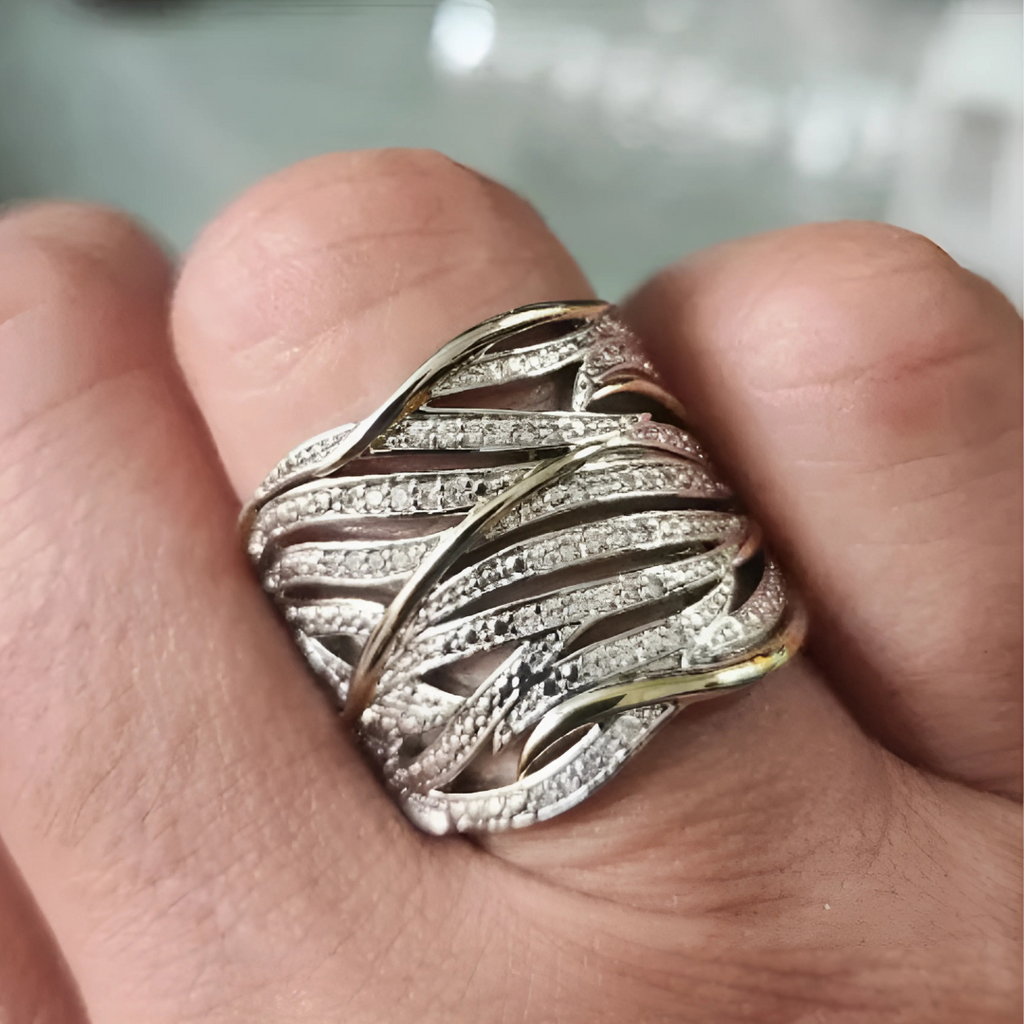 Elegant multi-layered twisted ring